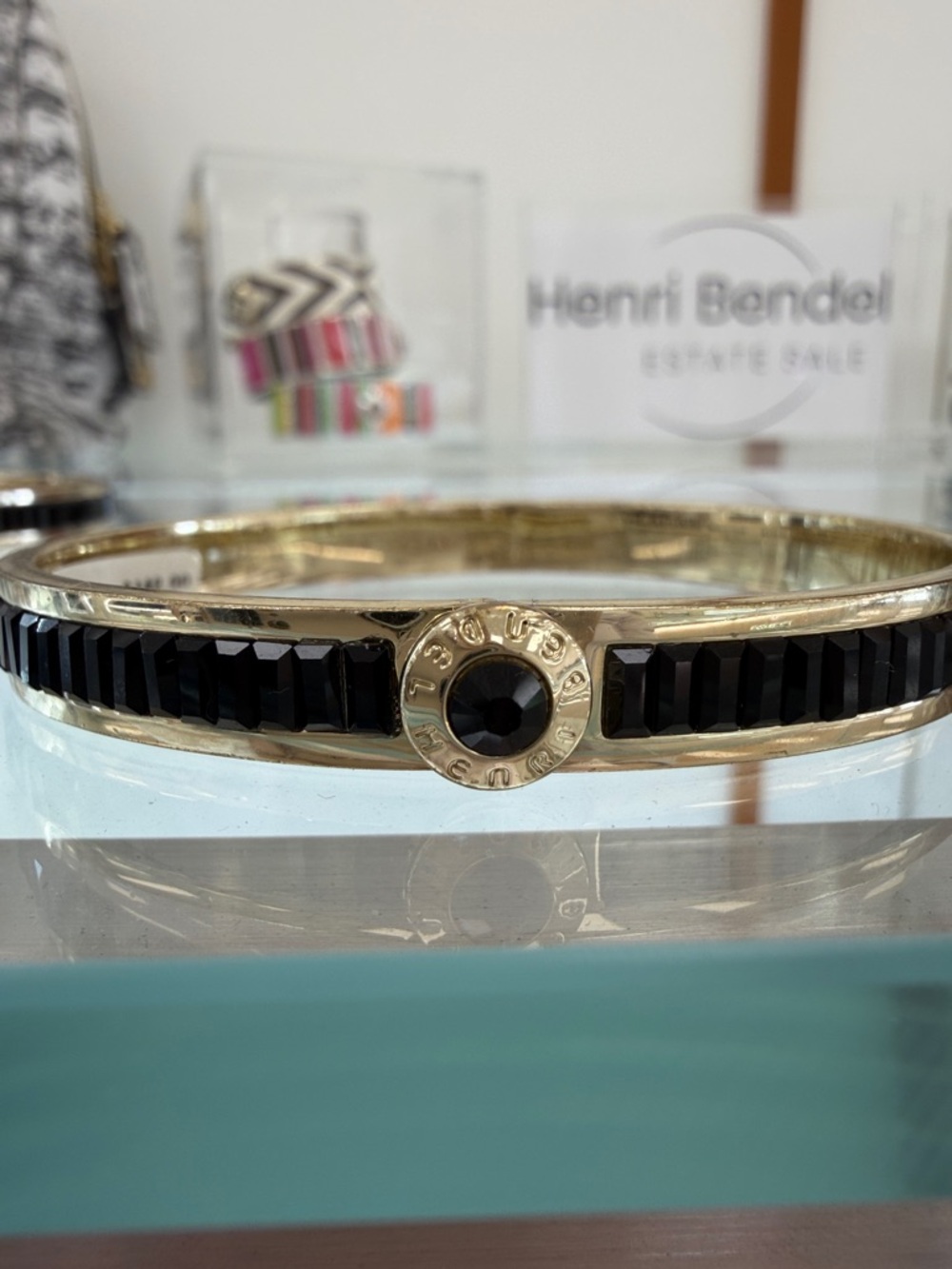 Henri Bendel Gold Tone Bangle with Black Faceted Stones